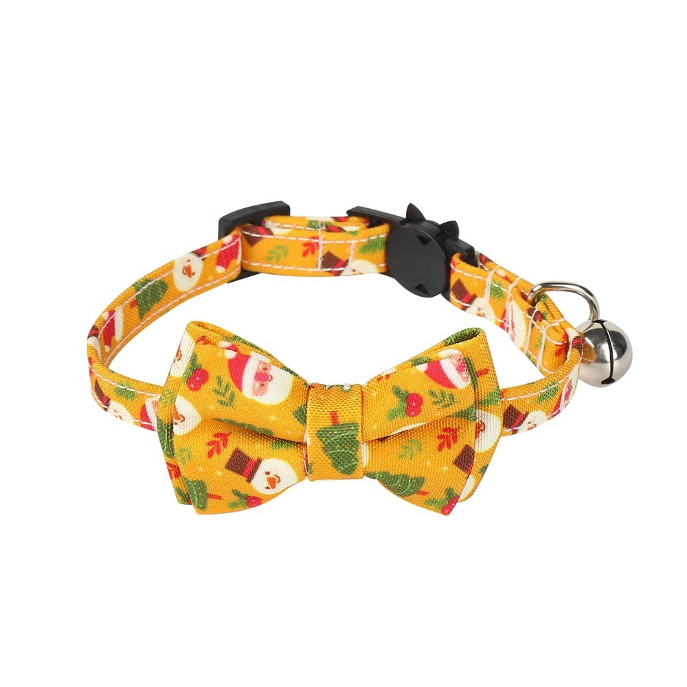 Cat collar with bow tie and bell on a white background