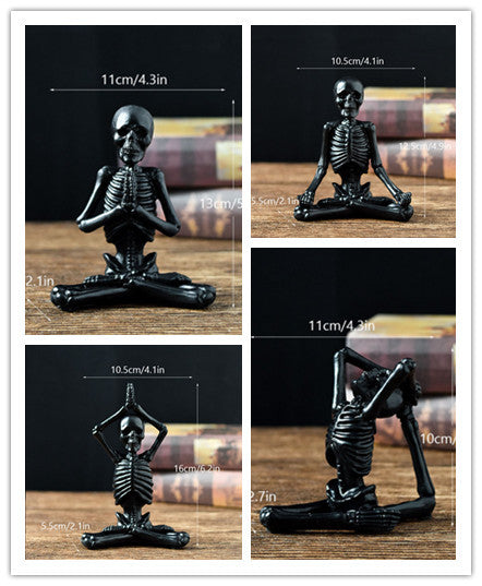 Black skeleton figurine in various poses with measurements on a wooden surface.