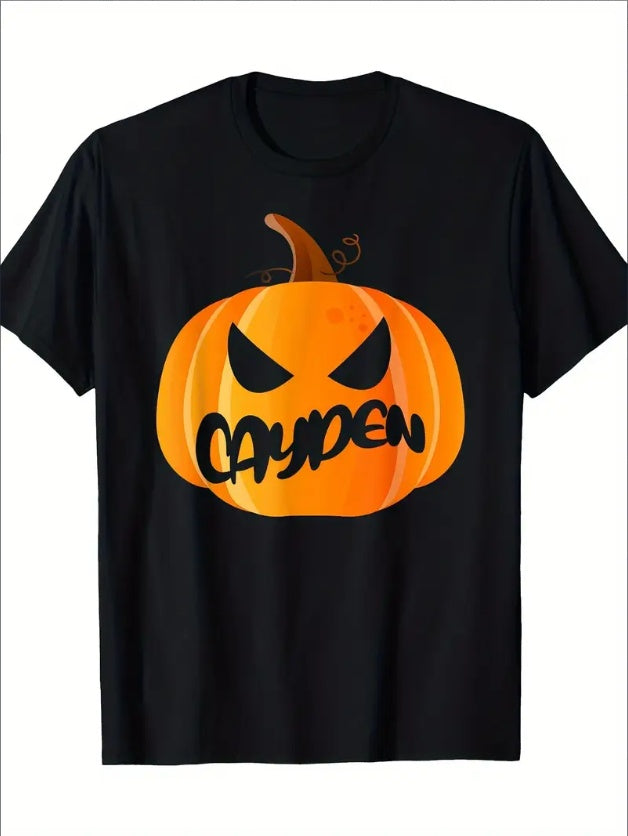 Black t-shirt with a pumpkin graphic and the name 'Cayden' on a white background