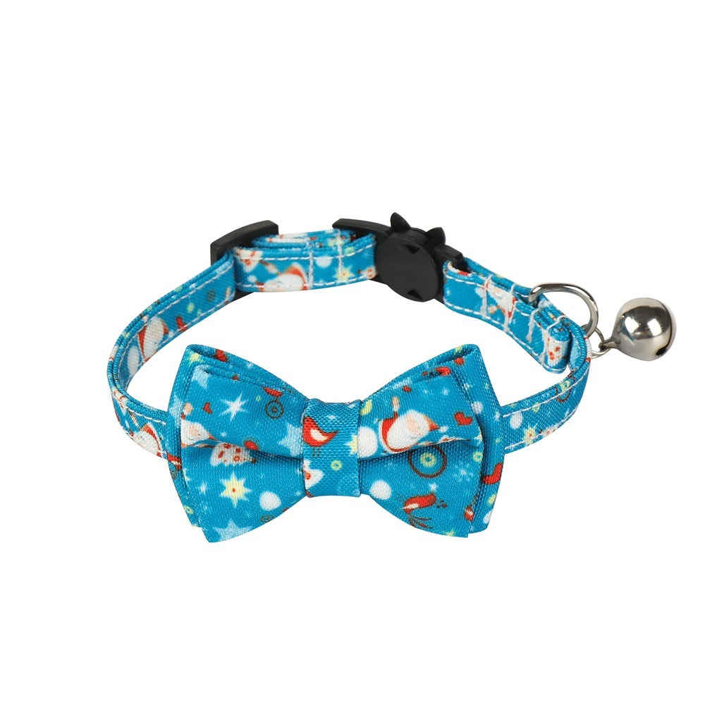 Cat collar with bow tie and bell on a white background