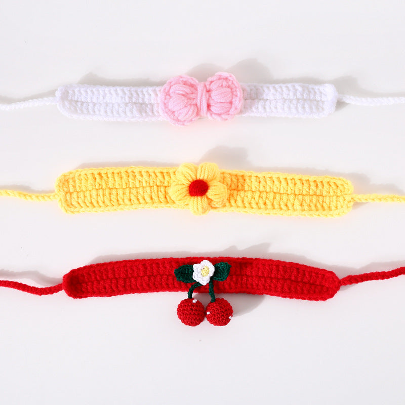 Three crocheted bracelets in white, yellow, and red with decorative elements on a white background.