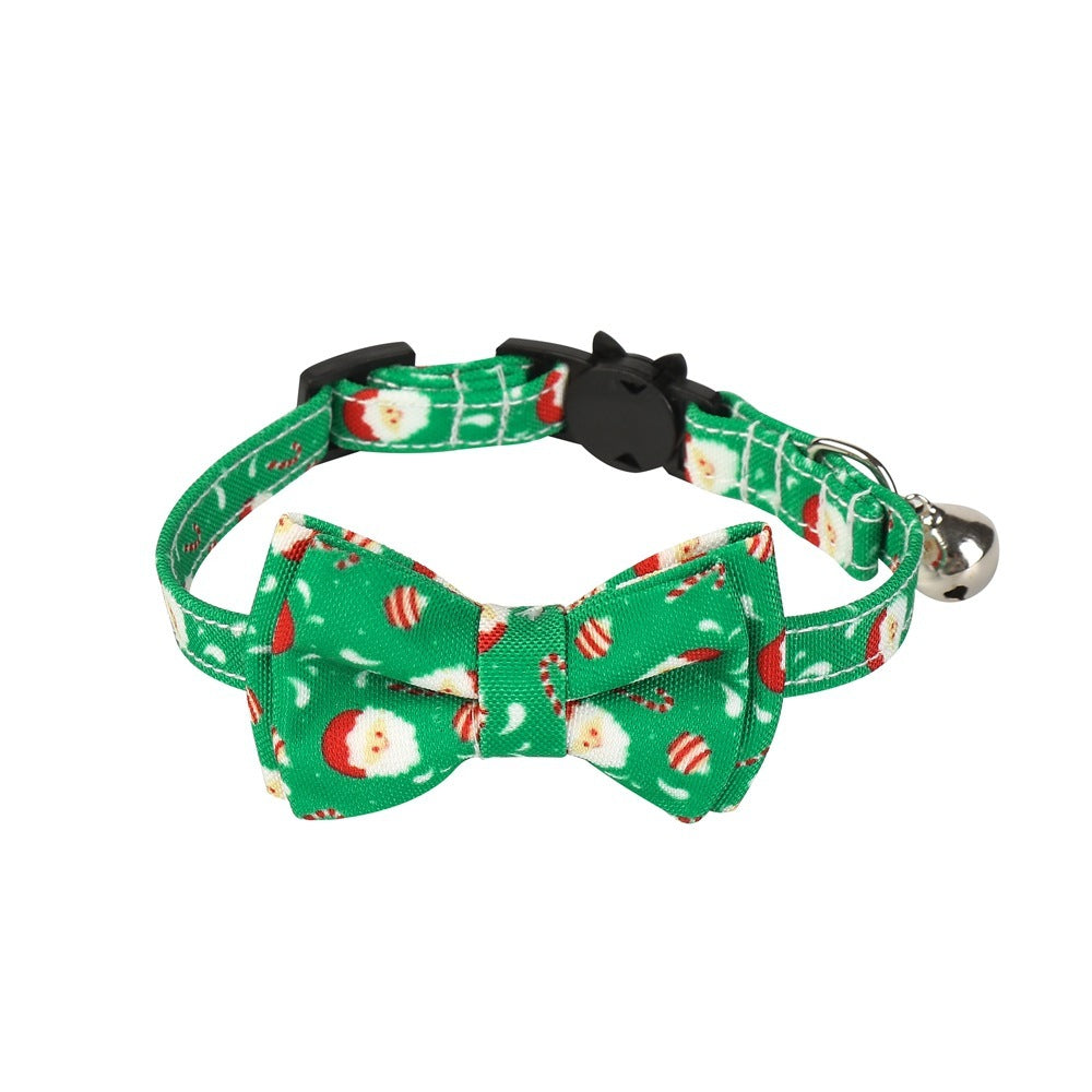 Green dog collar with festive pattern on a white background
