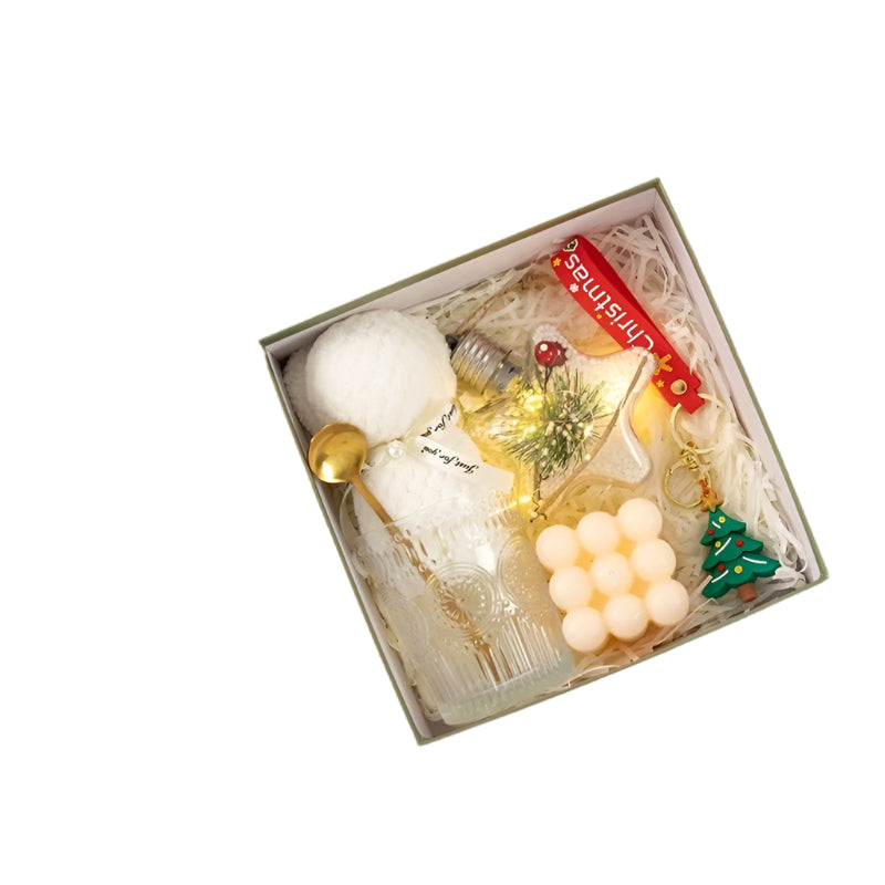 Christmas-themed gift set with decorative items on a white background