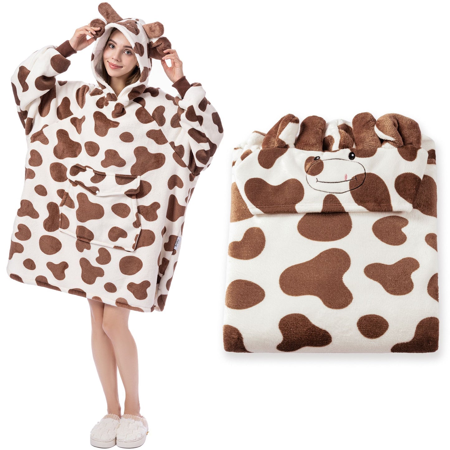 Cow-patterned poncho with hood and matching bag on a white background