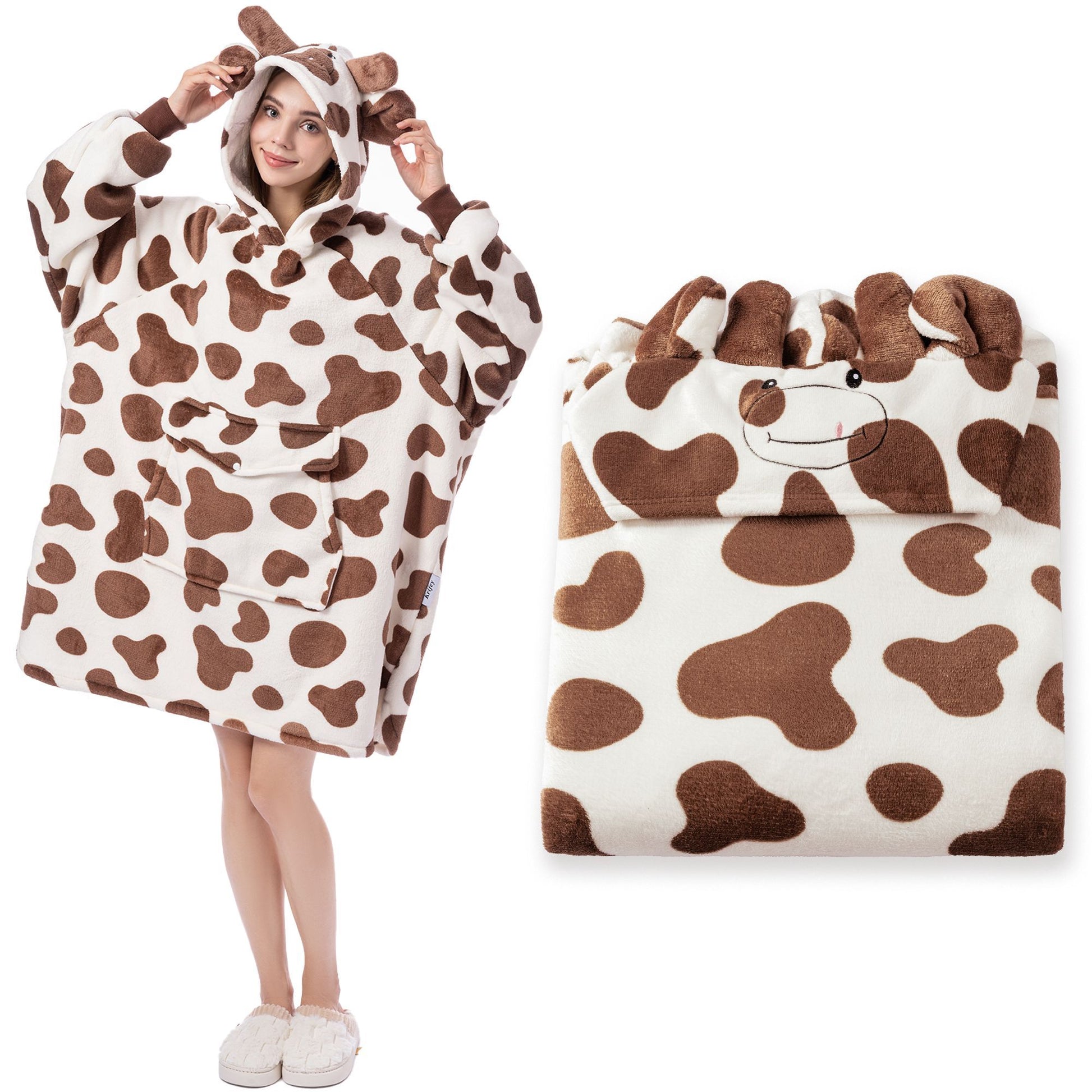 Cow-patterned poncho with hood and matching bag on a white background