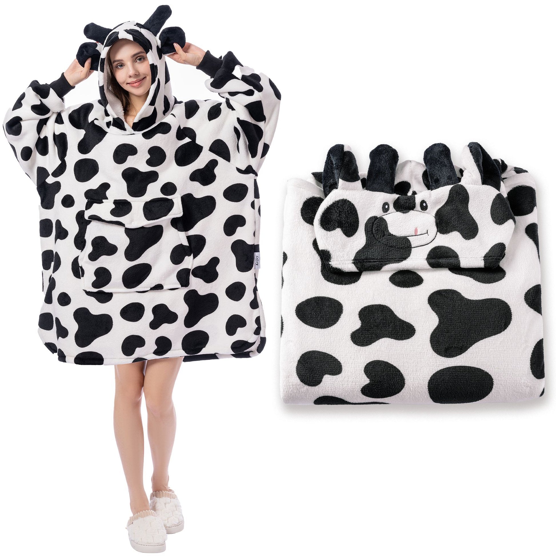 Cow-themed poncho with hood and matching bag on a white background