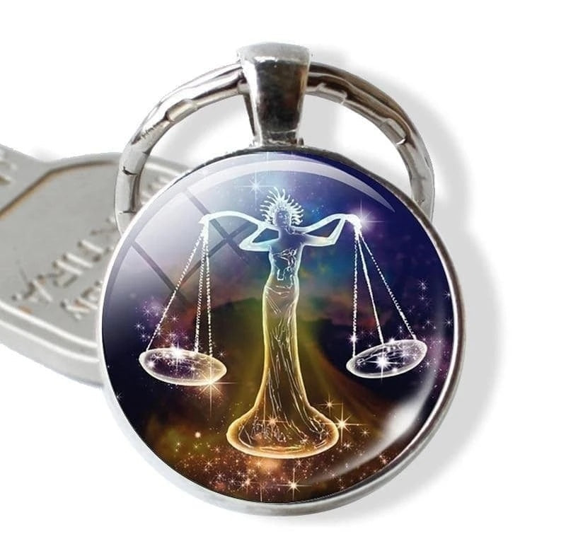 Keychain with Libra zodiac design on a white background