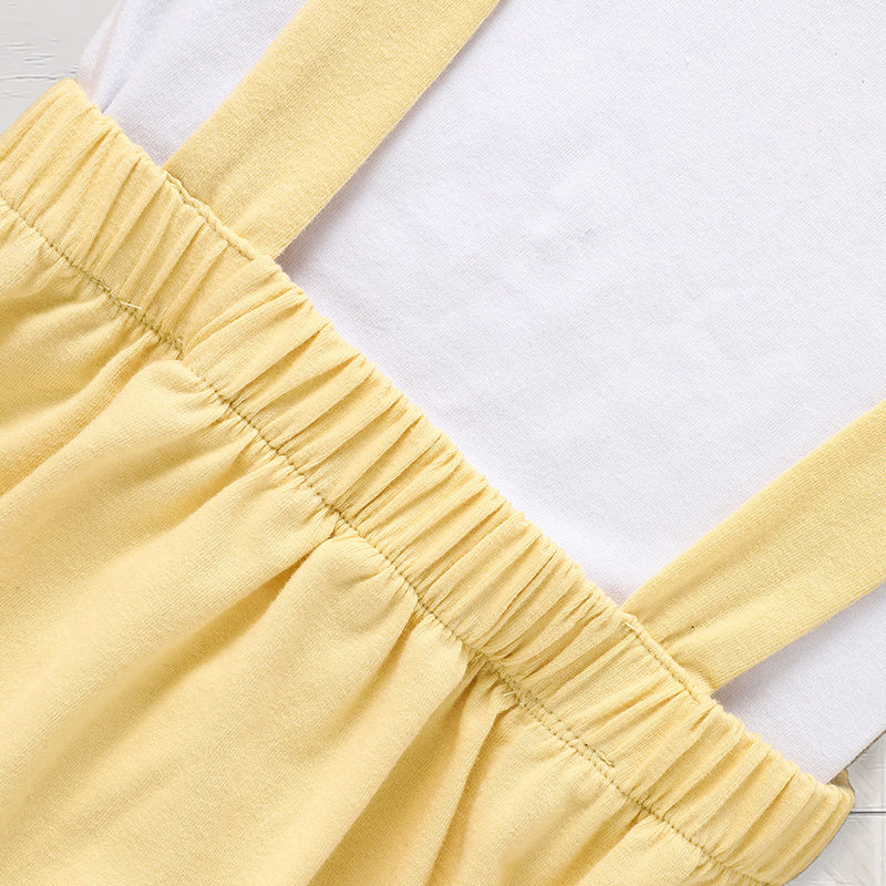 Yellow dress with straps on a white background