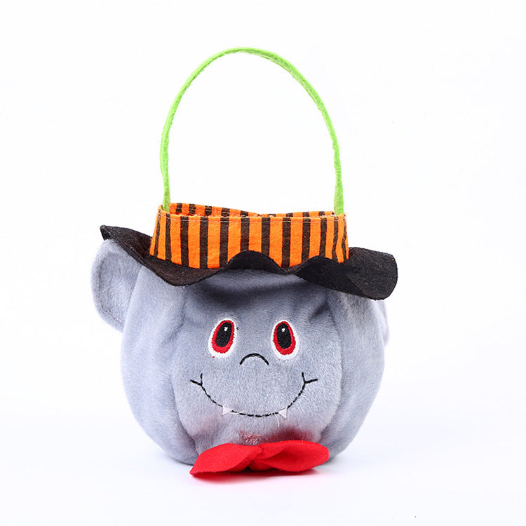 Halloween-themed plush toy with a striped bucket on a white background