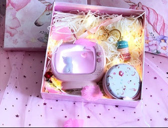 Gift set with unicorn design on a pink background