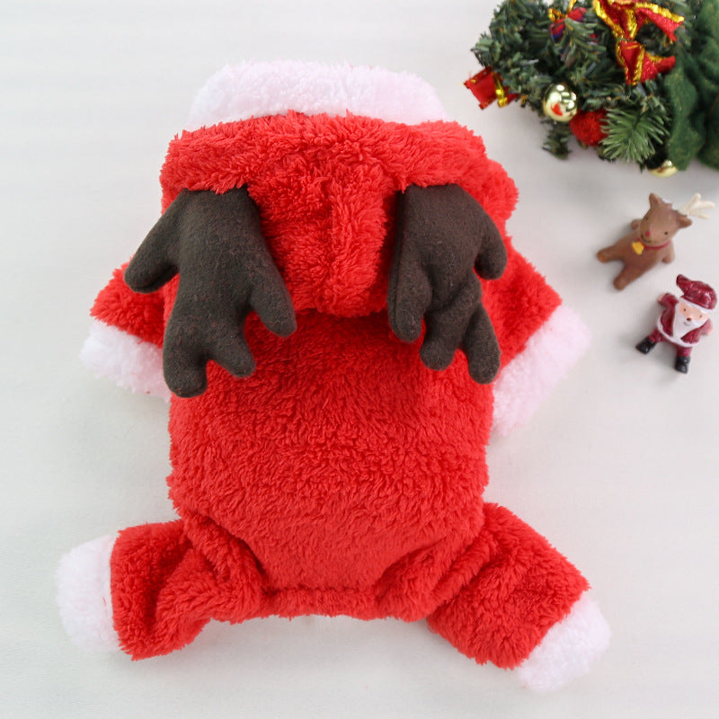Red plush reindeer toy with black antlers on a white background