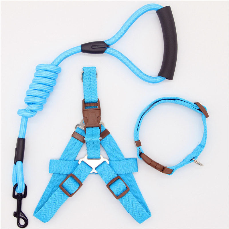 Blue dog harness, leash, and collar set on a white background