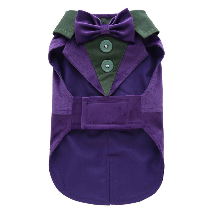 Purple dog coat with green collar and bow tie on a white background