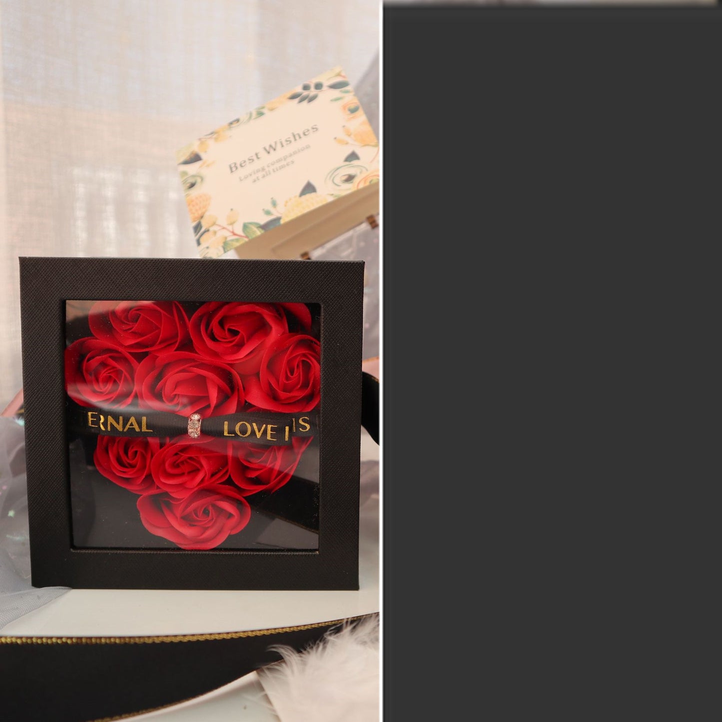 Box of red roses with 'Eternal Love' text on a light background