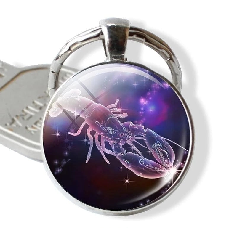 Keychain with a lobster design on a dark background