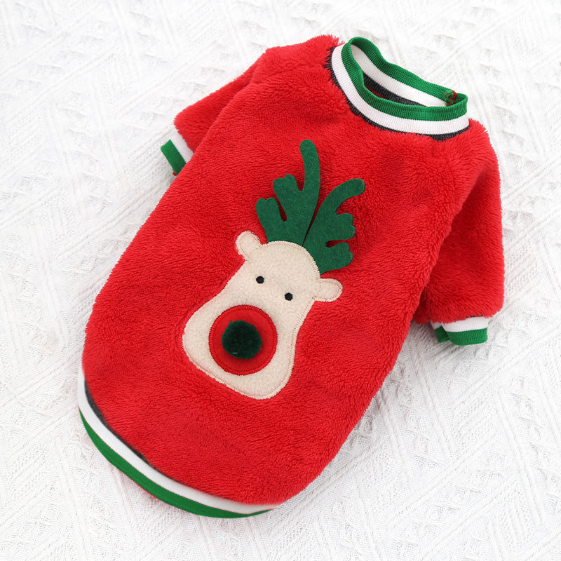 Red plush dog sweater with reindeer design on a white background