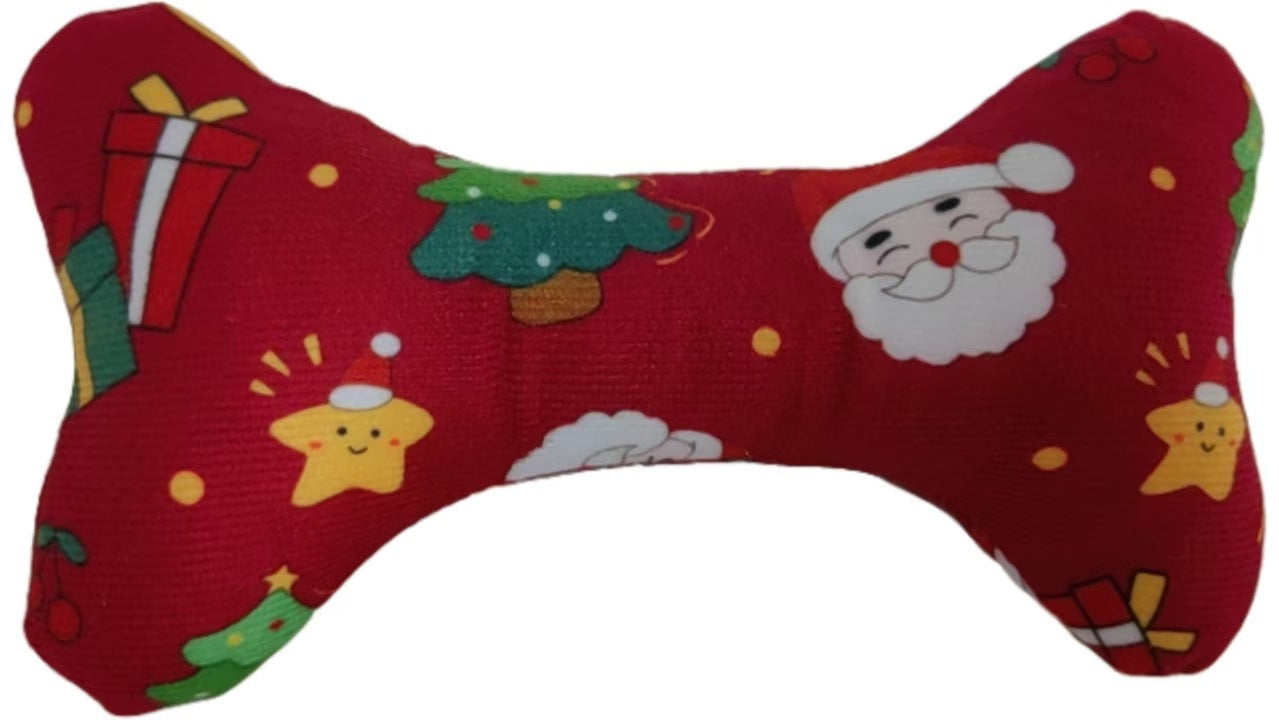 Red pillow with Christmas-themed decorations on a white background