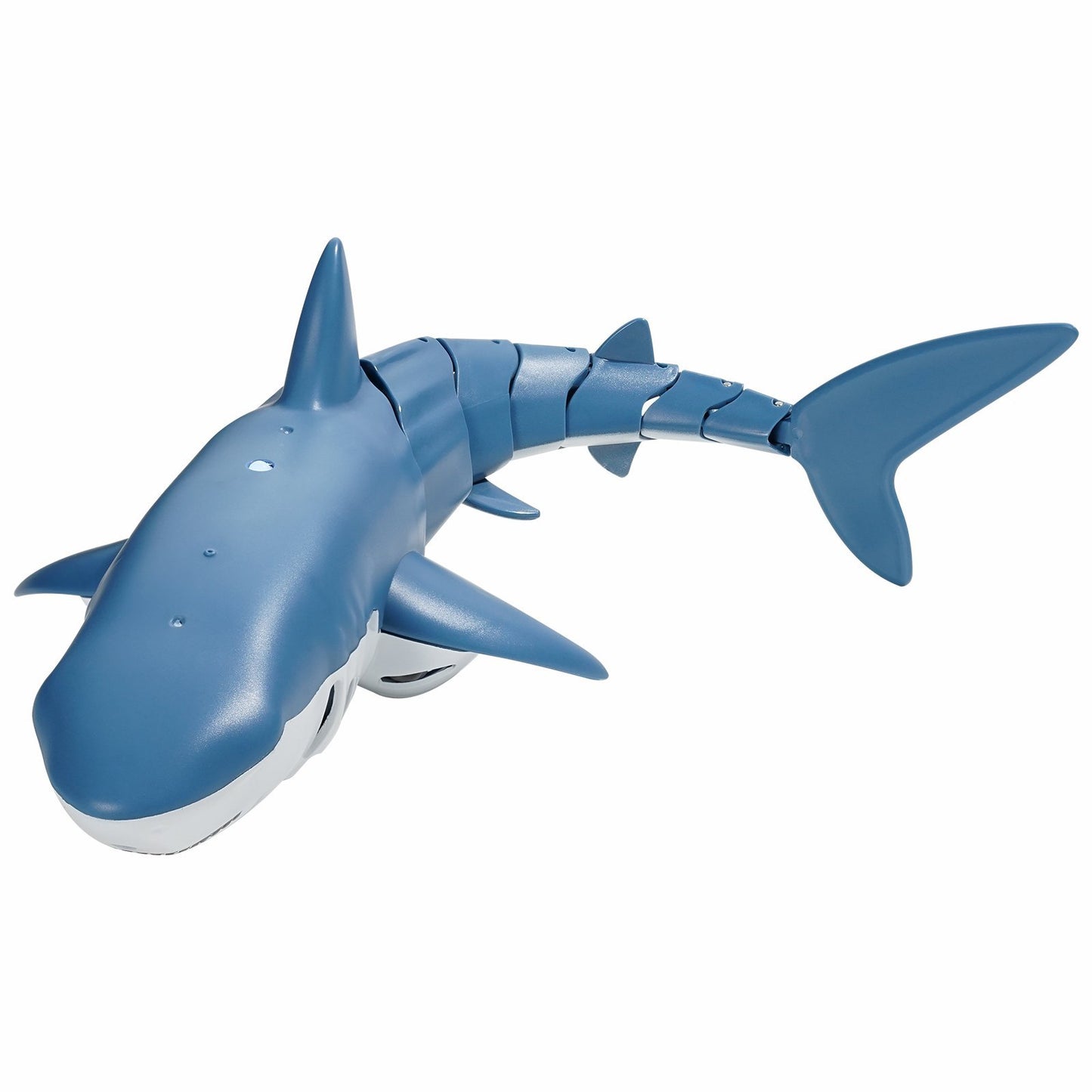 Blue toy shark on a white background