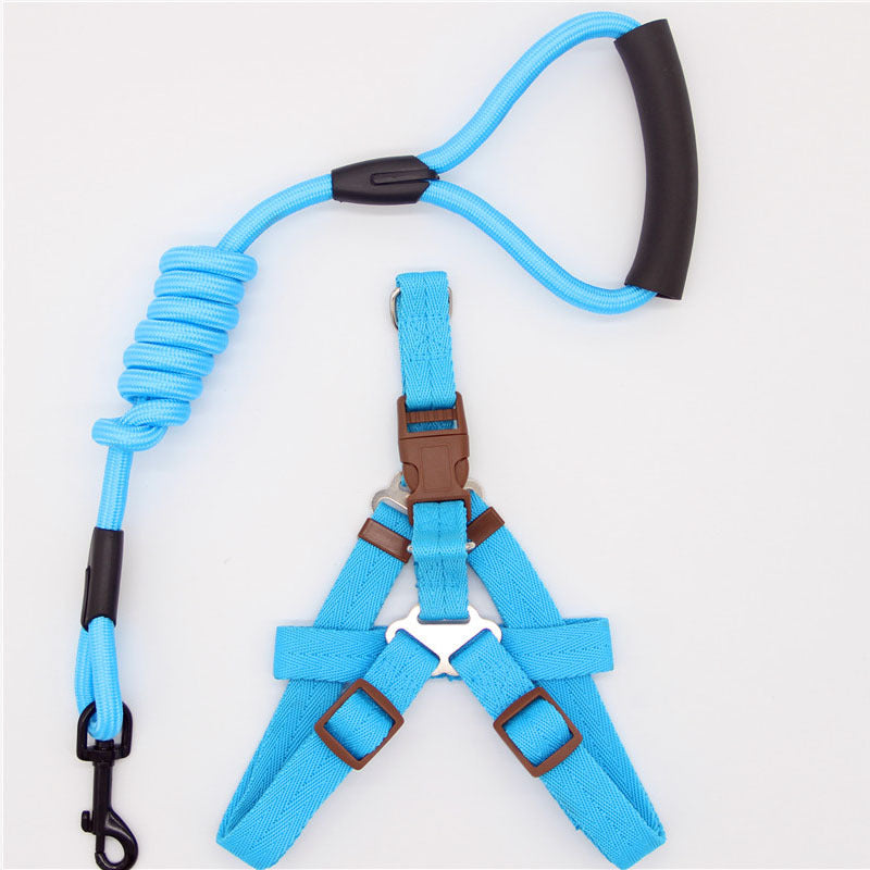 Blue dog harness and leash set with brown buckles on a white background