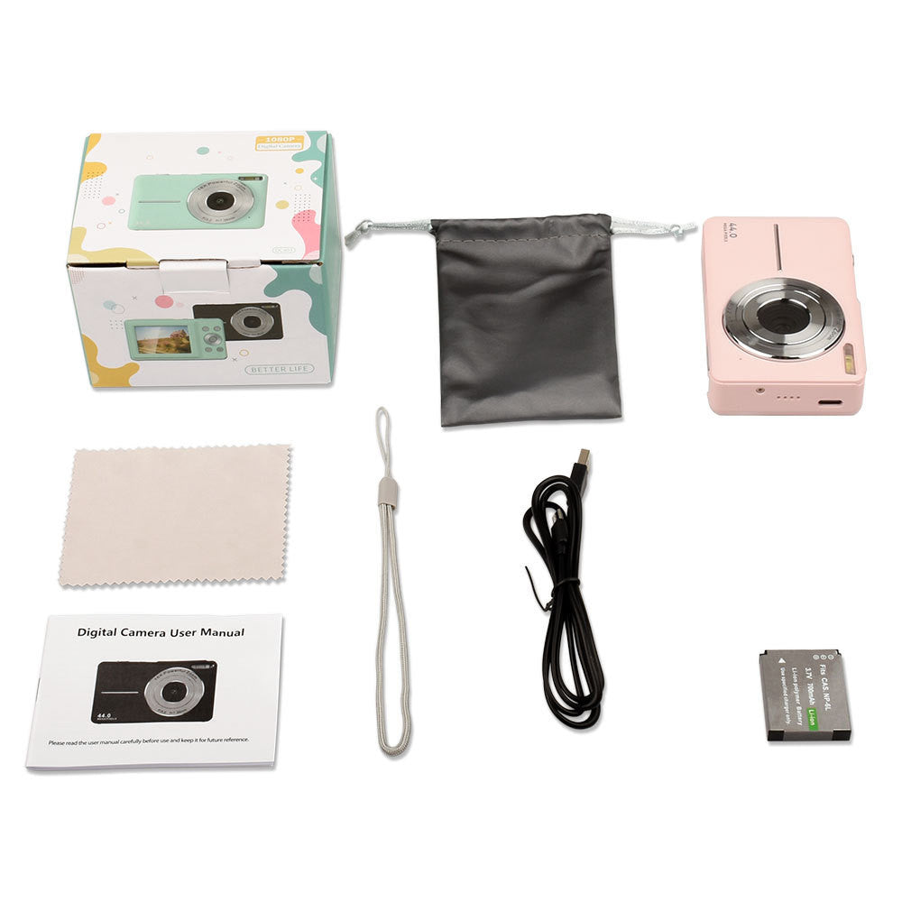 Digital camera set with packaging, cleaning cloth, user manual, battery, and cable on a white background