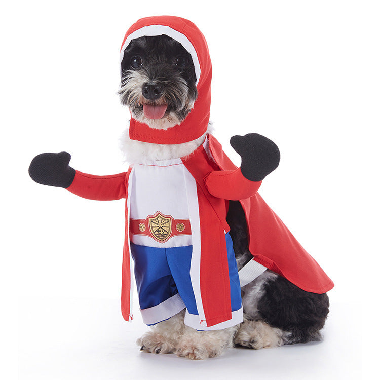 Dog wearing a superhero costume with red cape and gloves on a white background