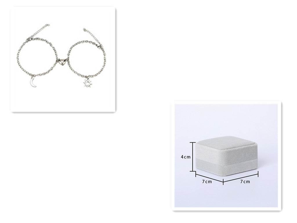 Silver bracelet with heart design on a white background, next to a gray jewelry box with dimensions.