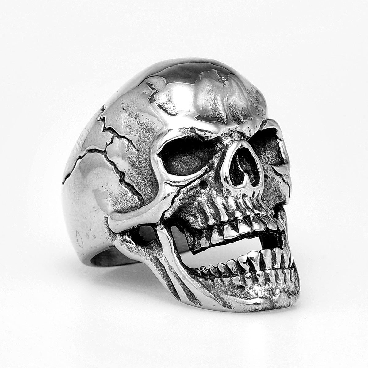 Silver skull ring on a white background