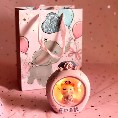 Pink decorative item with cartoon character on a pink background