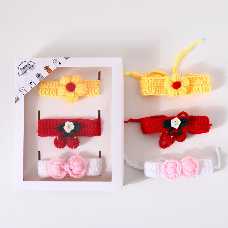 Set of colorful crochet headbands with flowers and berries on a white background
