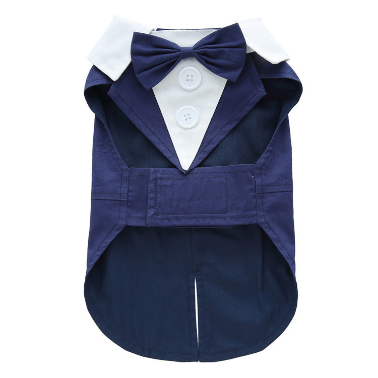 Navy blue dog tuxedo with white shirt and bow tie on a white background