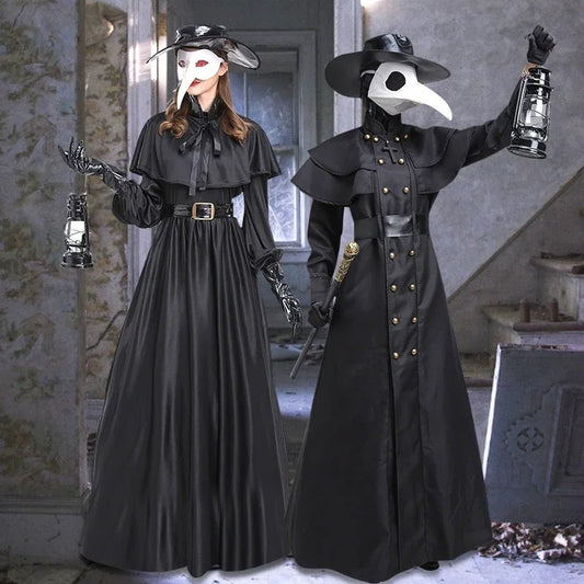Two individuals in dark, elaborate costumes with masks and props in an indoor setting.